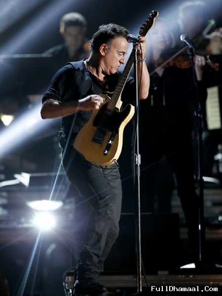 Singer Bruce Springsteen Performing On Red Carpet Stage At 54th Grammy Awards